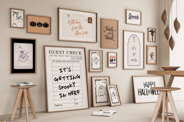 set of 15 halloween wall art for spooky fall decor in black, white, orange and purple