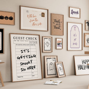 set of 15 halloween wall art for spooky fall decor in black, white, orange and purple