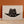 beige background with black cowboy hat, brown lettering inside hat that says don't be all hat and no cattle