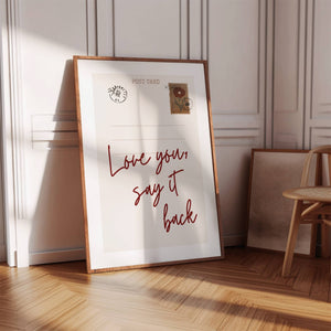 love you say it back quote on vertical postcard print with vintage floral stamp