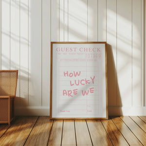 how lucky are we quote on light pink retro guest check wall art 