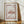 missouri state stamp poster with steamboat on river in deep burnt red