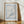 light blue massachusetts state stamp print with lighthouse on coast