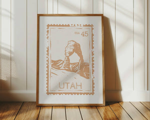 Utah state stamp print in vertical orientation muted orange color with arches national park rock formation