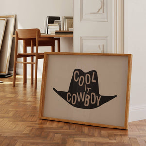 cool it cowboy print horizontal beige background with black cowboy hat and brown lettering