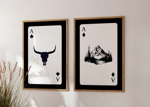 set of 2 playing card wall art with longhorn bull skull and mountain in black and white