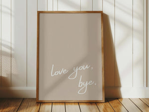 neutral beige background with white script typography love you bye quote vertical orientation wall art