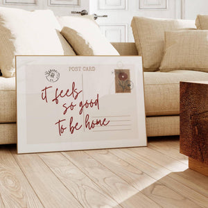 it feels so good to be home quote on horizontal postcard poster