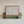 chef was cute would eat here again quote with 5 stars in hand drawn script typography on horizontal wall art with beige stripe background and oval cutout