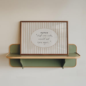 chef was cute would eat here again quote with 5 stars in hand drawn script typography on horizontal wall art with beige stripe background and oval cutout