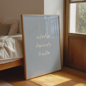 aloha howdy hello print in white hand drawn heart font script on light blue background vertical orientation wall art