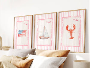 pink coastal wall art set of 3 beach stamp prints with american flag, sailboat and lobster